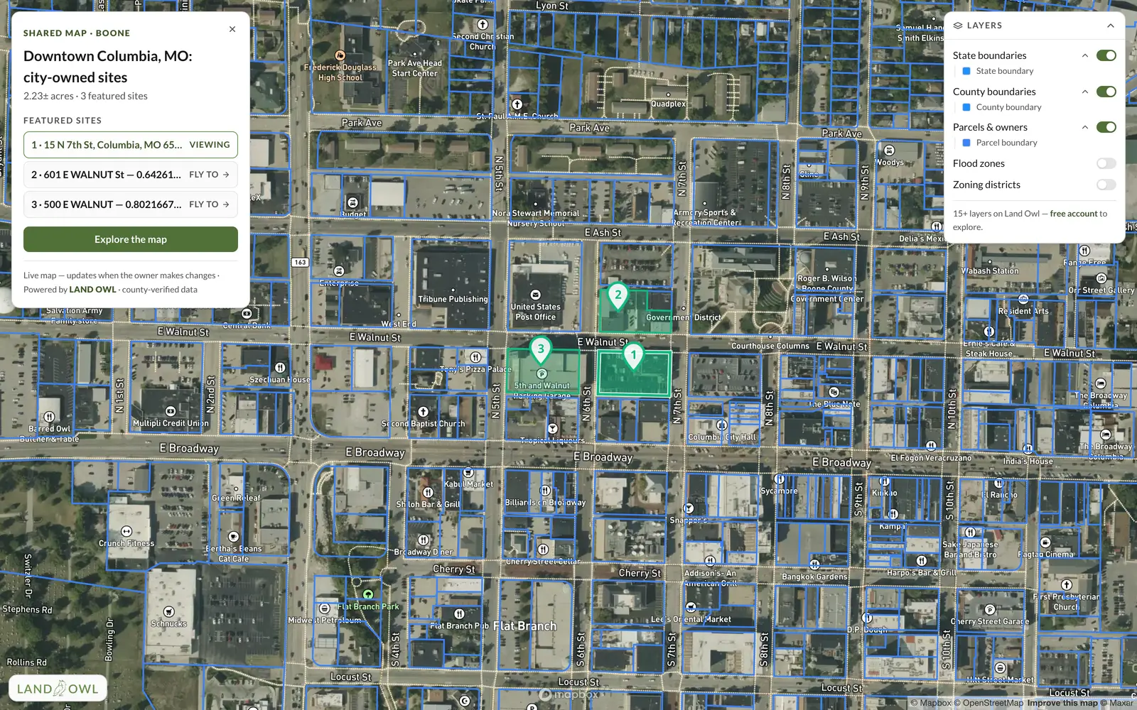 A Land Owl shared map open in a browser with no account: satellite imagery of downtown Columbia, Missouri, with City of Columbia–owned parcels featured and a panel of parcel details.